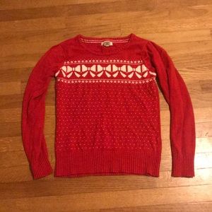 Red holiday sweater with bows & puff shoulders